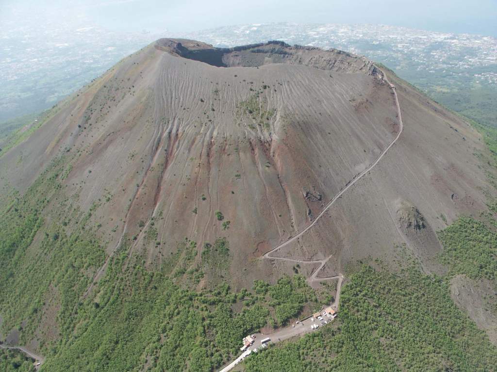 The barren crater of Vesuvius today - with the suburbs of Naples in the background