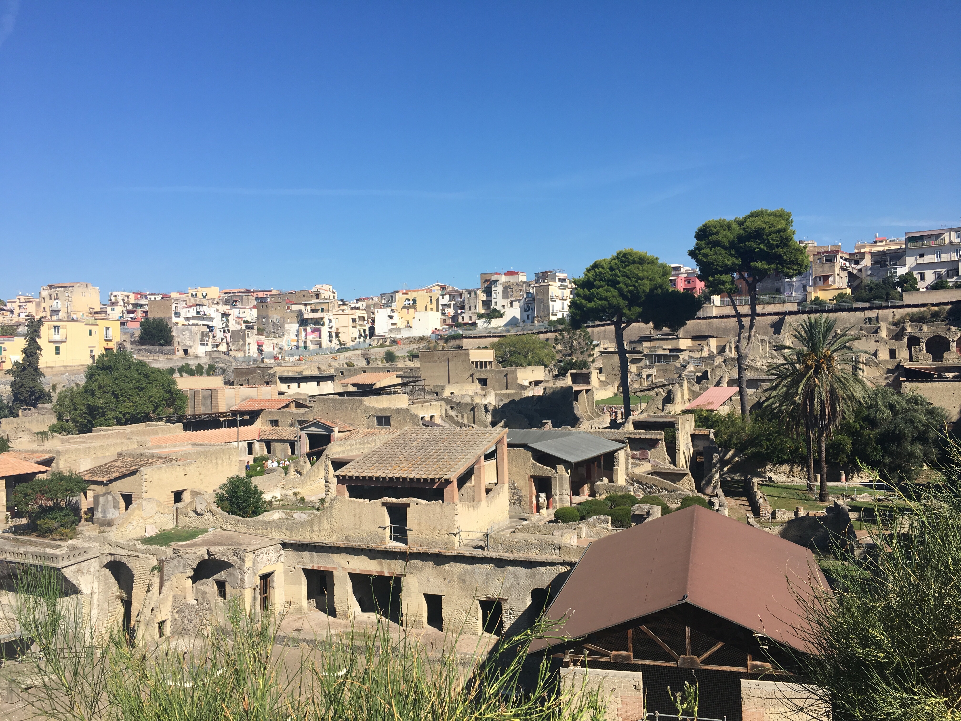 Herculaneum - perfect example of the old buildings (Roman) at the bottom of the photo with the modern town of Ercolano above.