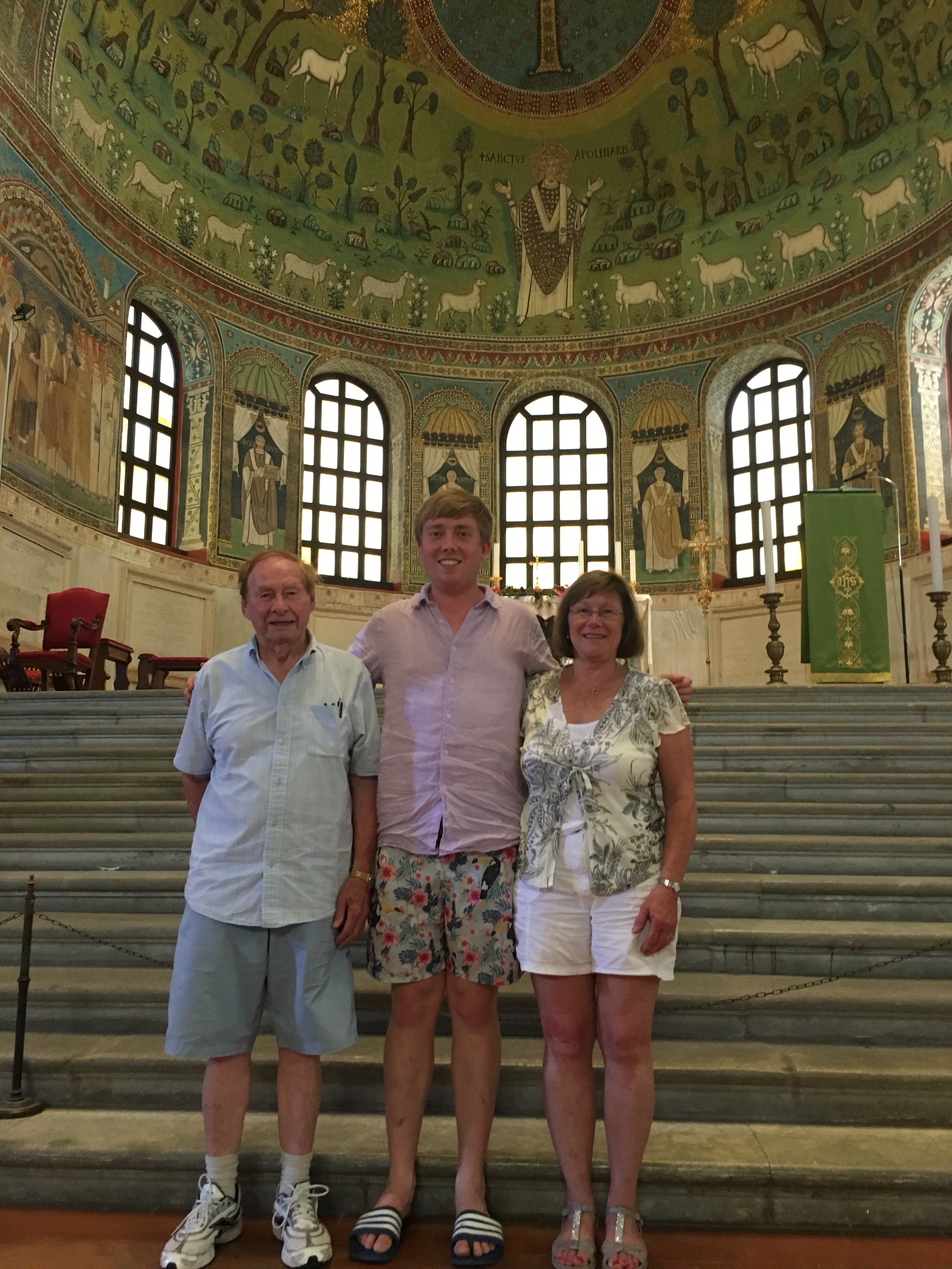   Visitors gaze in awe at the mosaics that decorate the apse, Sant' Apollinare in Classe - www.educated-traveller.com