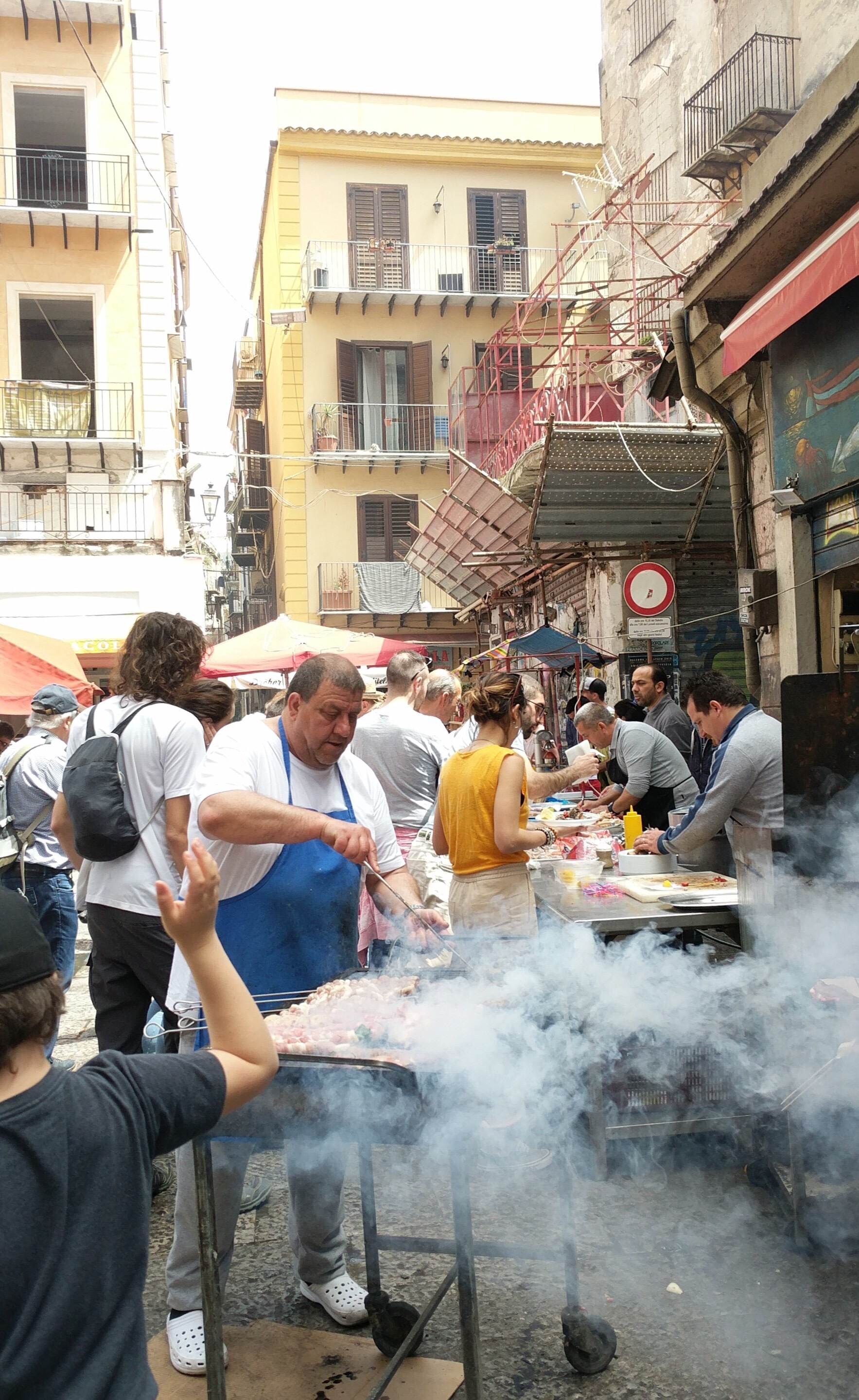 It's hard work running a barbecue, Palermo, Sicily 