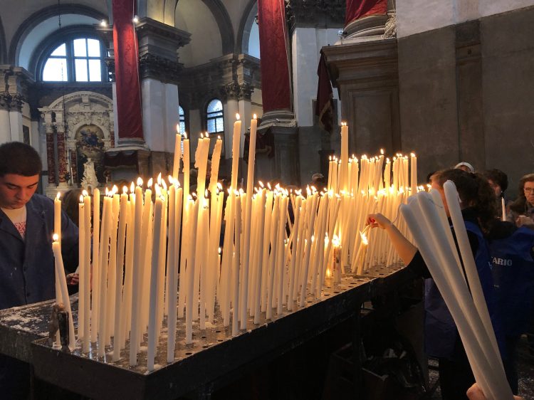 A forest of candles at Santa Maria Salute, Venice - November, 2019