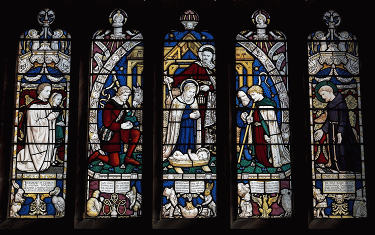 Stained glass with a difference! Alice in Wonderland characters across the base of the windows