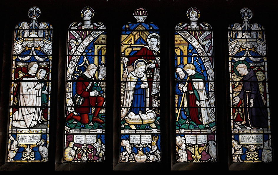 Stained glass with a difference! Alice in Wonderland characters across the base of the windows